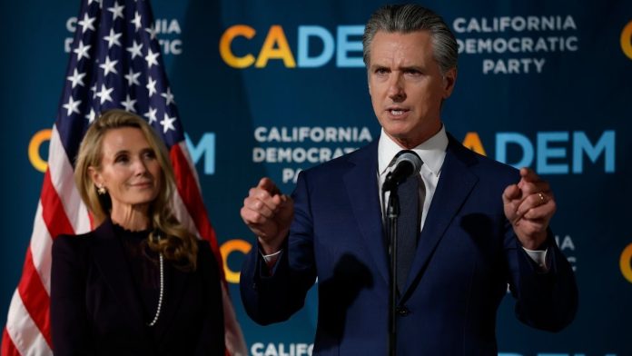 WOAH! - Gavin Newsom's Wife Pushes Him Then Humiliates Him On Stage